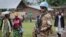 A Jordanian UN peacekeeper stands guard outside a base camp in the town of Bunagana, in Congo, May 16, 2012. 