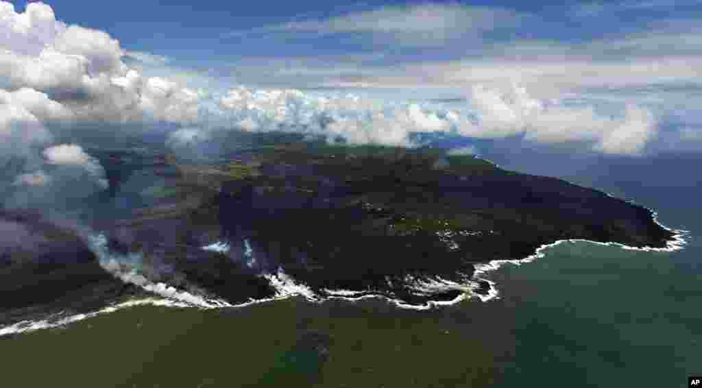 តំបន់​&nbsp;Kapoho ភាគ​ច្រើន​រួម​ទាំង​ចំណុច​លំនាច​ផង​នោះ​នៅ​ពេល​នេះ​ត្រូវ​បាន​គ្រប​ដណ្ដប់​ដោយ​កម្អែ​ថ្មីៗ​នៃ​ភ្នំភ្លើង​ដោយ​នៅ​សល់​តែអចលនទ្រព្យ​បន្តិច​បន្តួច​ប៉ុណ្ណោះ​​ ខណៈ​ពេល​ដែលចំណុច​ចន្លោះ​​ Kilauea Volcano ខាង​ក្រោមនៅ​បន្ត​ផ្ទុះ​ នៅ​&nbsp;Pahoa រដ្ឋ​ហាវ៉ៃ សហរដ្ឋ​អាមេរិក។