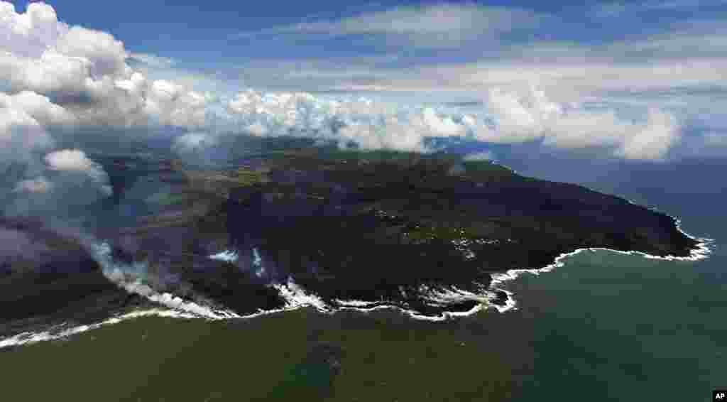 Most of the Kapoho area including the tide pools is now covered in fresh lava with few properties still intact as the Kilauea Volcano lower east rift zone eruption continues in Pahoa, Hawaii.