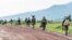 FILE — M23 rebels prepare to leave after a ceremony to mark the withdrawal from their positions in eastern Democratic Republic of Congo, on December 23, 2022. 