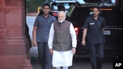 FILE - Indian Prime Minister Narendra Modi arrives at first session of parliament in New Delhi, India. 