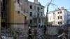 Rescuers search for victims in an apartment building destroyed by a Russian missile attack in Lviv, Western Ukraine, Sept. 4, 2024. 