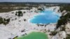 Pemandangan dari udara memperlihatkan sebuah danau bernama Kulong Biru di Koba, Pulau Bangka, 2 Mei 2021. (Foto: REUTERS/Willy Kurniawan)