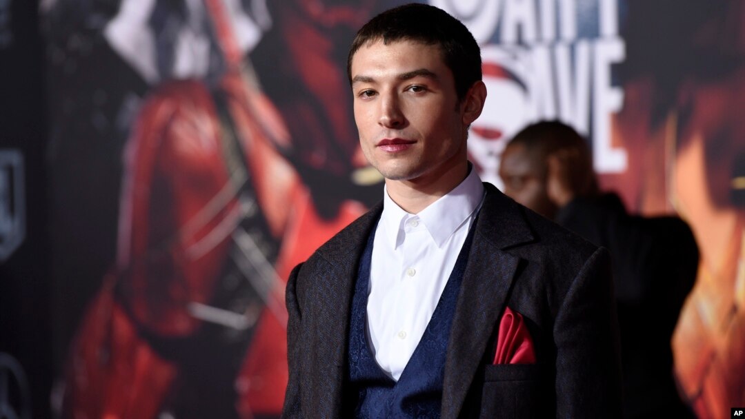 Ezra Miller, a cast member in "Justice League," poses at the premiere of the film at the Dolby Theatre, Nov. 13, 2017, in Los Angeles. 