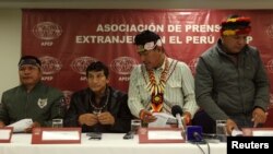 Chiefs of Amazonian tribes, Emerson Sandi, Alfonso Lopez, Aurelio Chino and Carlos Sandi attend a news conference with the foreign media in Lima, Aug. 22, 2017.