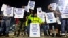 Longshoremen strike at midnight at Bayport Terminal on Oct. 1, 2024, in Houston. 