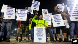 Longshoremen strike at midnight at Bayport Terminal on Oct. 1, 2024, in Houston. 