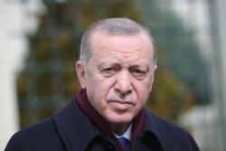 Turkish President Recep Tayyip Erdogan addresses the media after the Friday prayers in Istanbul, Turkey, March 12, 2021. (Presidential Press Office/Handout via Reuters)