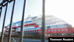 The 40 people on the MS Roald Amundsen who tested positive have been admitted to the University Hospital of North Norway in Tromsoe, north of the Arctic Circle, where the ship currently is docked.