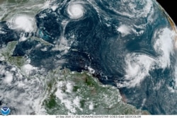 ہری کین سیلی کی سیٹلائٹ سے لی جانے والی ایک تصویر۔ طوفان اس وقت خلیج میکسیکو پر سے گزر رہا ہے۔ 15 ستمبر 2020