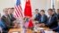 资料照片：美国财政部长斯科特·贝森特(左一)、美国贸易代表贾米森·格里尔(左二)以及中国副总理何立峰(右一)2025年5月11日在日内瓦会面讨论美中贸易和关税问题。 