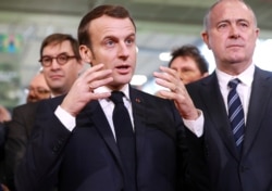 French President Emmanuel Macron criticizes, Feb. 22, 2020, Cameroon's handling the conflict in its English-speaking regions.