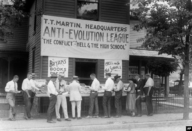 Evangelist T.T. Martin's books against the theory of evolution are sold at an outdoor stand in Dayton, Tenn., 1925, scene of the Scopes trial.