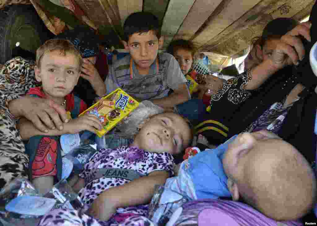 The United States began to drop relief supplies to beleaguered Yazidi refugees fleeing Islamist militants in Iraq. Here displaced people, who fled from the violence in the province of Nineveh, arrive at Sulaimaniya province, Aug. 8, 2014.
