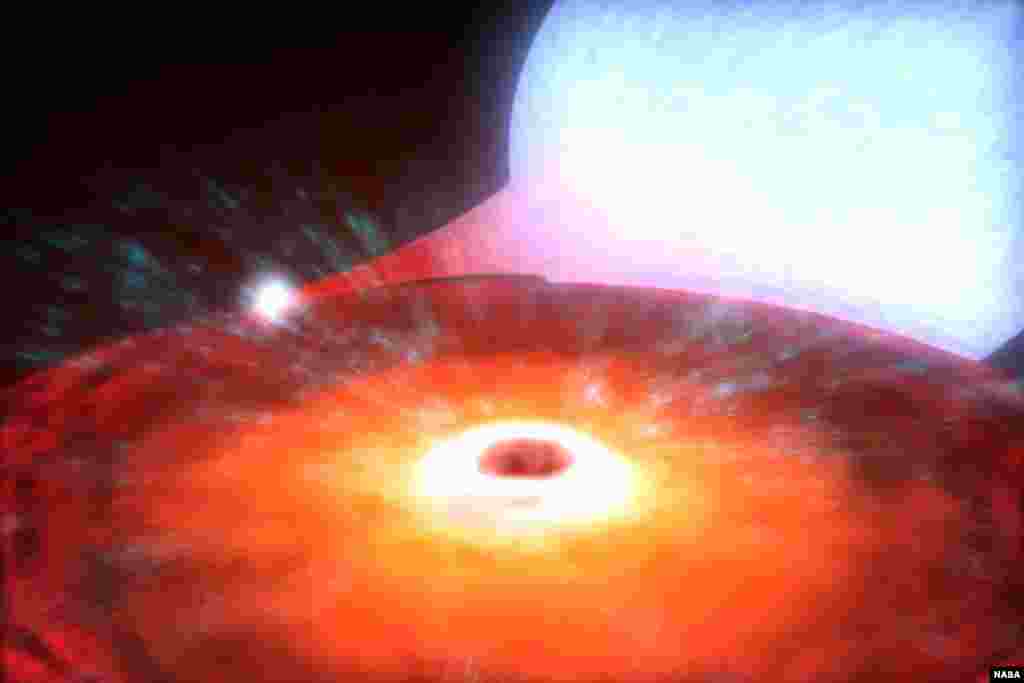 Lubang hitam terkecil yang pernah ditemukan, bagian dari sistem bintang biner bernama XTE J1650-500, yang berukuran 3,8 kali lebih besar daripada matahari Bumi. (NASA/CXC/A. Hobar)