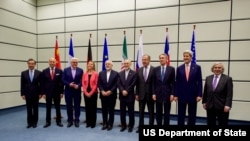 Secretary Kerry Posed for a Group Photo With EU, P5+1, and Iranian officials before the final plenary of Iran nuclear negotiations in Vienna, Austria.