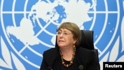 FILE - U.N. High Commissioner for Human Rights Michelle Bachelet attends a news conference at the European headquarters of the United Nations in Geneva, Switzerland, Dec. 9, 2020.