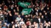 FILE - Crystal Palace fans mock the opposing team with flags of Saudi Arabia before a match between Crystal Palace and Newcastle United, in Selhurst Park, London, Oct. 23, 2021. (Action Images via Reuters)