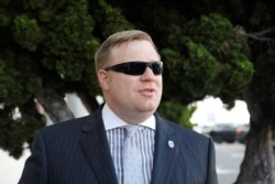 FILE - Tim Parlatore, attorney for U.S. Navy SEAL Special Operations Chief Edward Gallagher, arrives for trial at Naval Base San Diego, in San Diego, California, July 2, 2019.