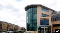 A general view of AstraZeneca offices and the corporate logo in Cambridge, England, July 18, 2020. 