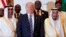 President Donald Trump poses for photos with King Salman, right, and others at the Arab Islamic American Summit, at the King Abdulaziz Conference Center, May 21, 2017, in Riyadh, Saudi Arabia.