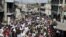 Protesters called up to demonstrate by opposition groups march in Port-au-Prince, Haiti, Feb. 12, 2016.