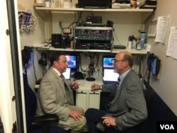 White House bureau chief Steve Herman (left) and senior correspondent Peter Heinlein discussing the day’s assignments in the small VOA studio in the basement of the West Wing.