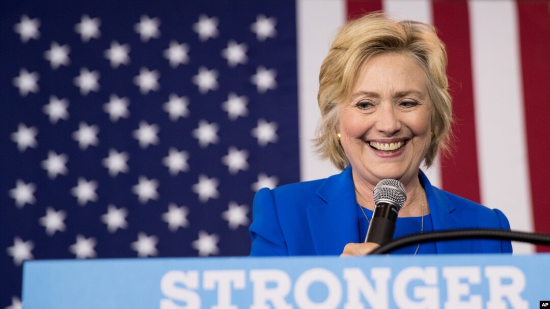 FILE - Democratic presidential candidate Hillary Clinton pauses while speaking at a rally at Johnson C. Smith University, in Charlotte, N.C., Sept. 8, 2016.