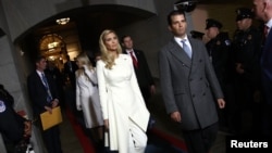 Ivanka Trump, left, and Donald Trump Jr. arrive on the West Front of the U.S. Capitol in Washington, D.C., Jan. 20, 2017.
