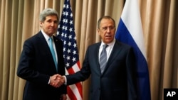 John Kerry, et Sergueï Lavrov