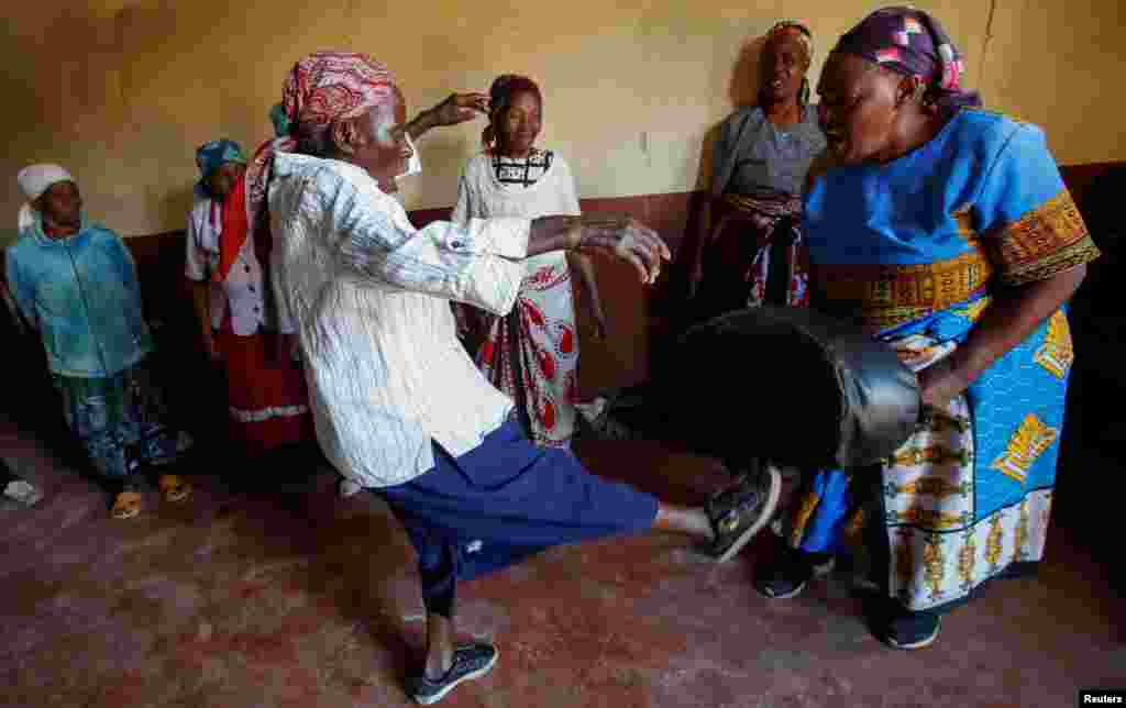 Beatrice Nyariara, 81, trains with Esther Njeri, 82, and members of the Granny Defense &quot;Cucu Jikinge&quot; program that trains elderly women on the basic Karate skills for self-defense, in Nairobi, Kenya.