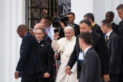 Pope Francis waves to wellwishers as he leaves after a meeting at the Cathedral of the Immaculate Conception in the capital Maputo, Mozambique Thursday, Sept. 5, 2019.