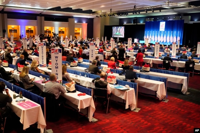 Delegates are seated for the first day of the Republican National Convention, Monday, Aug. 24, 2020, in Charlotte, N.C. (AP Photo/Chris Carlson, pool)