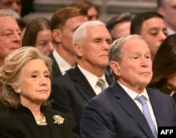 From left, former Vice President Al Gore, former Secretary of State Hillary Clinton, former Vice President Mike Pence and former President George W. Bush attend former President Jimmy Carter's funeral in Washington on Jan. 9, 2025.