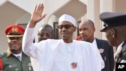 FILE - Nigeria President Muhammadu Buhari, waves after a meeting in Abuja, Nigeria, Jan. 9, 2017. 