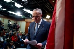 FILE - Senate Minority Leader Chuck Schumer of New York leaves after speaking at a news conference, Dec. 16, 2019, on Capitol Hill in Washington.
