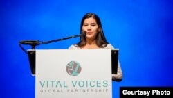 Tep Vanny, 31, a prominent Cambodian housing rights activist, talks to over 2,500 people after receiving the Vital Voices Global Leadership Award 2013 (Leadership in Public Life Award) at the Kennedy Center in Washington, DC, April 2, 2013. (Courtesy of Vital Voices/Kate Hauschka)