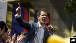 FILE - Juan Guaido, president of the Venezuelan National Assembly, delivers a speech during a public session with opposition members, in Caracas, Jan. 11, 2019.