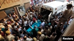 A five-year-old rape victim is moved to the All India Institute of Medical Sciences hospital from Swami Dayanand hospital for treatment in New Delhi, April.19, 2013.