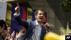 FILE - Juan Guaido, president of the Venezuelan National Assembly, delivers a speech during a public session with opposition members, in Caracas, Jan. 11, 2019.