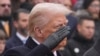 President-elect Donald Trump participates in a wreath laying ceremony at the Tomb of the Unknown Soldier at Arlington National Cemetery, in Arlington, Virginia, Jan. 19, 2025.