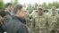 U.S. Special Representative for Ukraine Negotiations Kurt Volker, third from left, meets with Ukrainian troops at an undisclosed location near Popasna, Donbas region, Ukraine, May 15, 2018. (M. Gongadze/VOA)