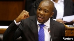 FILE - Opposition Democratic Alliance (DA) party leader Mmusi Maimane speaks during the motion of no confidence against South African president Jacob Zuma in parliament in Cape Town, South Africa, Aug. 8, 2017.