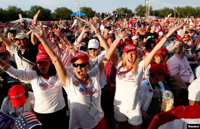 Supporters react during a campaign rally with U.S. President Donald Trump in Panama City Beach, Fla., May 8, 2019.