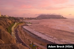 The sun sets over the Pacific Ocean in Lima's fashionable Miraflores district.