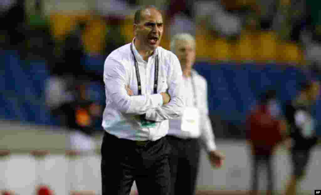 Tunisia's Samir Trabelssi shouts to his players during their African Cup of Nations soccer match against Morocco in Libreville