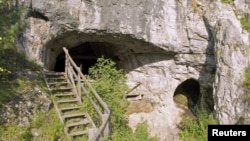 The remains of a female Neanderthal were found at Denisova Cave in the Altai Mountains in southern Siberia near the Russia-Mongolia border, shown in this 2011 photo released Feb. 17, 2016.