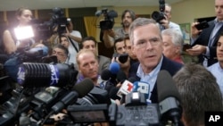 Republican presidential candidate, former Florida Gov. Jeb Bush, takes questions from the news media following a town hall at La Progresiva Presbyterian School, Tuesday, Sept. 1, 2015, in Miami. 