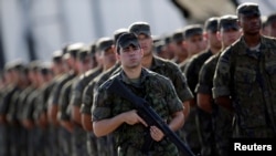 Brazilian army forces soldiers are pictured as they arrive at the Rio de Janeiro Air base to provide security during the Rio 2016 Olympic Games in Rio de Janeiro, Brazil, July 15, 2016. 