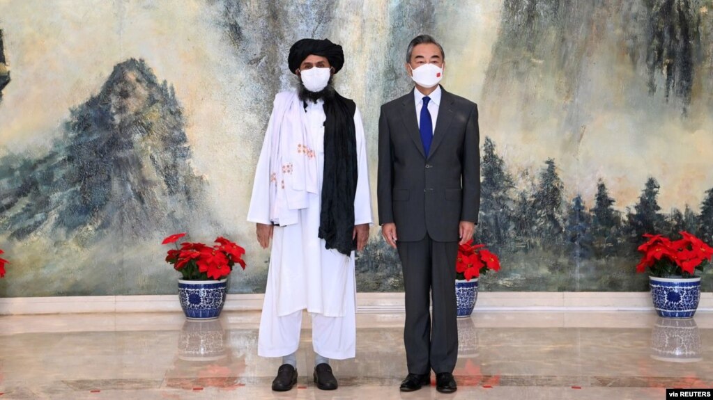 2021年7月28日中国国务委员兼外交部长王毅在中国天津会见阿富汗塔利班政治首脑毛拉·巴拉达尔(photo:VOA)